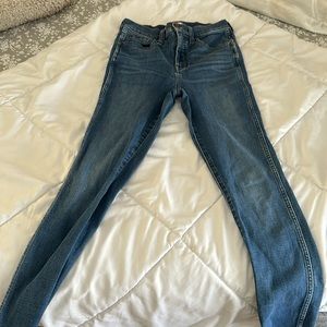 Never worn madewell jeans with raw hem.
